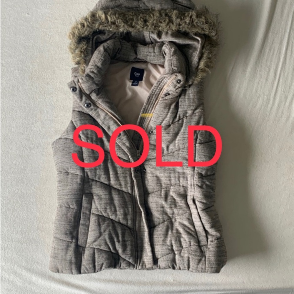 Nice warm Gap vest in good used condition.